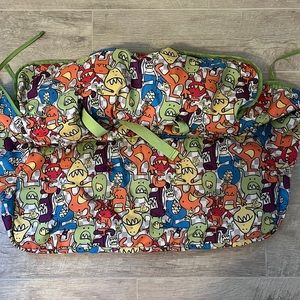 Truly scrumptious x Heidi Klum infant shopping cart seat cover — monster print